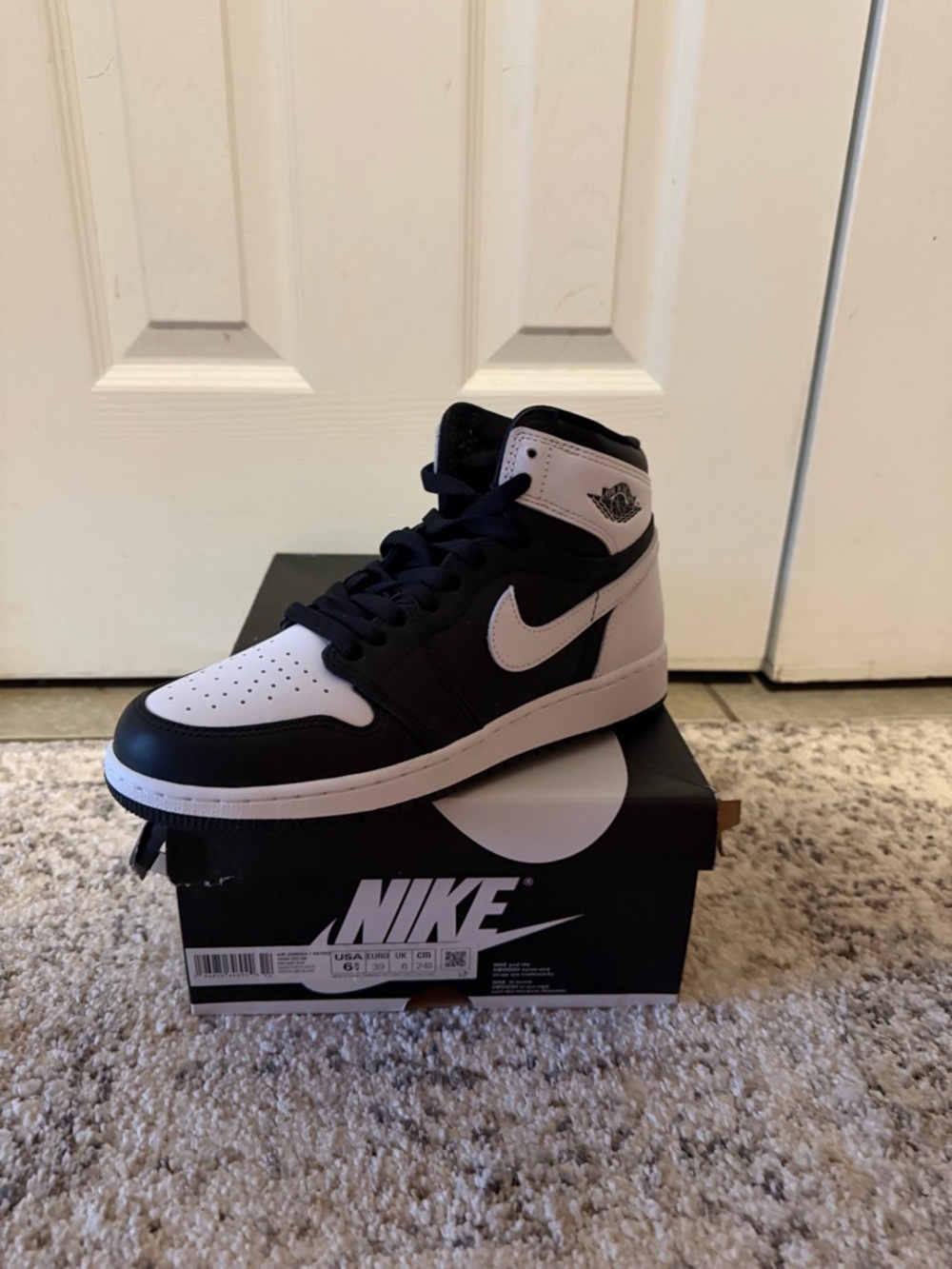 Jordan Black and White High-Top Sneakers